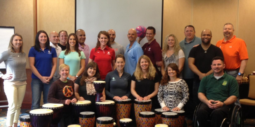 Mike Veny facilitating an interactive drumming workshop with the Wounded Warrior Project's Physical Health & Wellness Team.